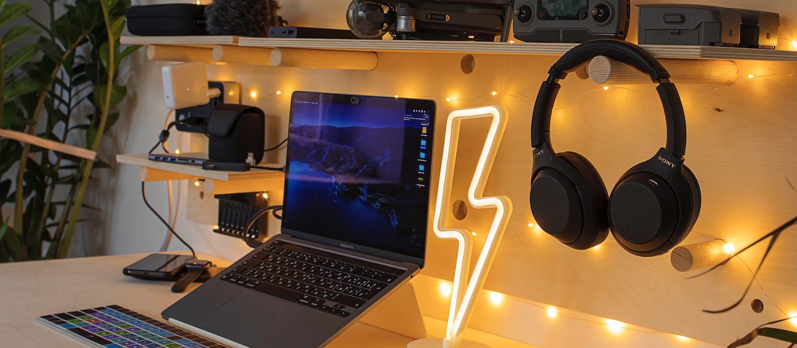 Photo by vadim kaipov black and silver laptop computer beside black and gray headphones